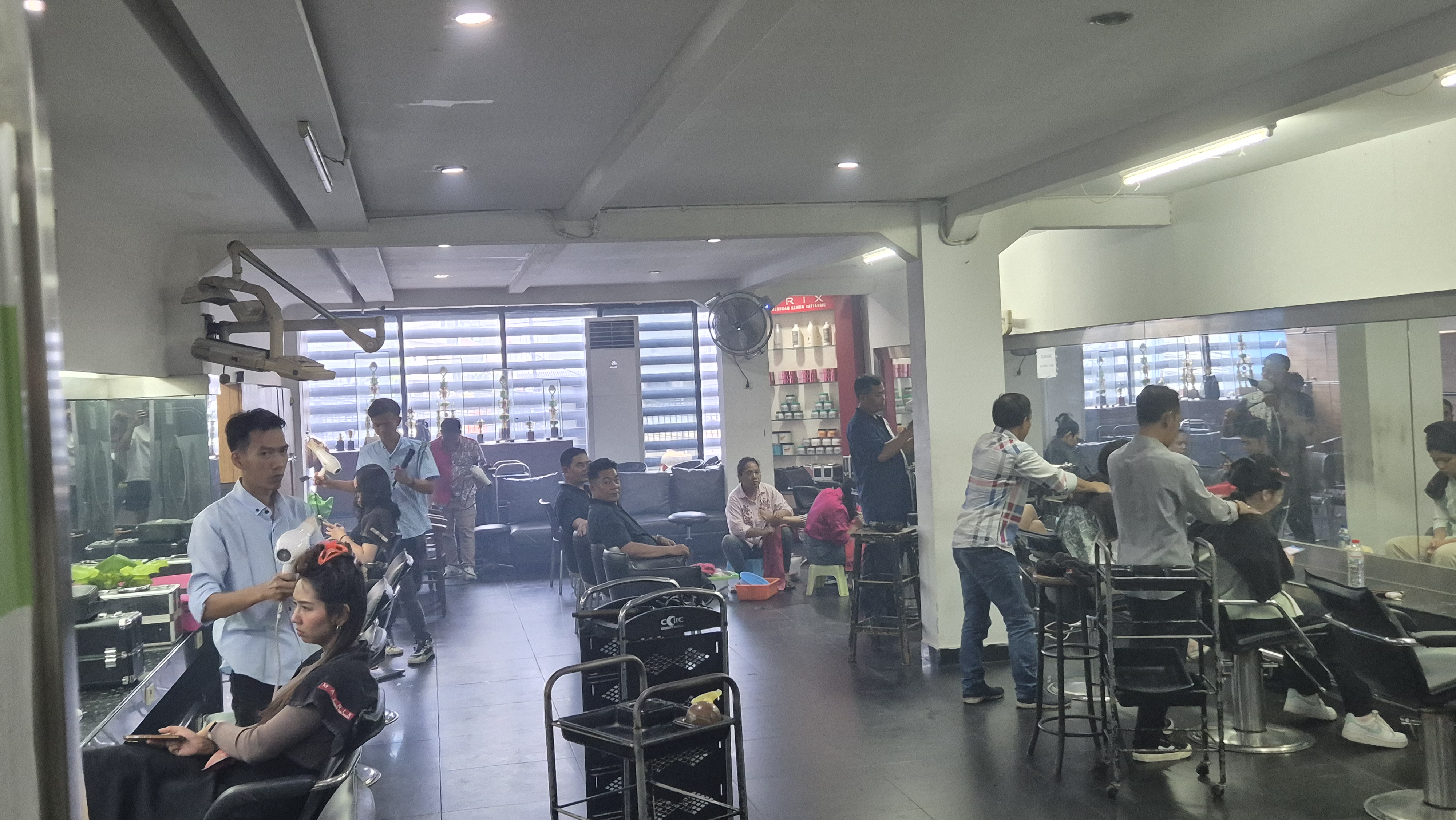 Busy treatment room with people